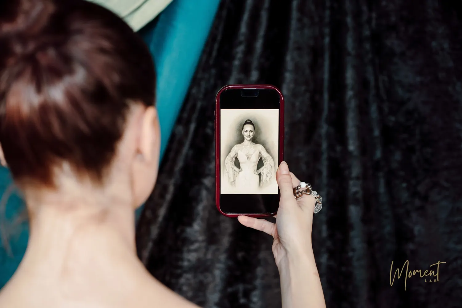 A guest viewing her sketch-style AI portrait on her phone